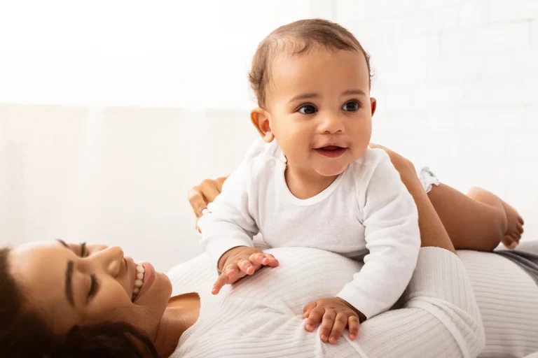 mom building strength in baby