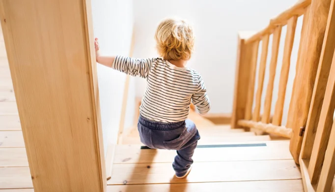 toddler climbing stairs