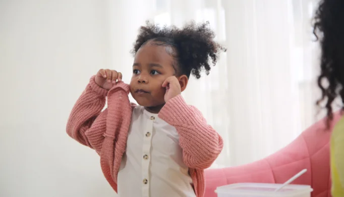 toddler dressing herself
