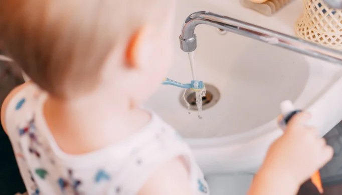 toddler brushing teeth