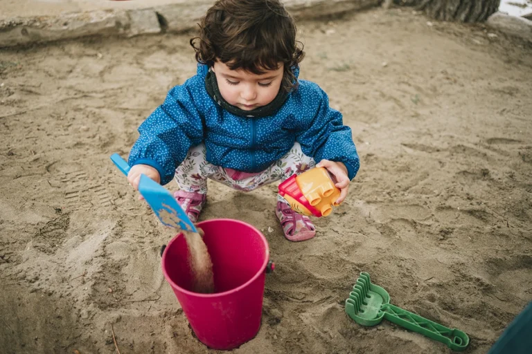 child participating in sensory play